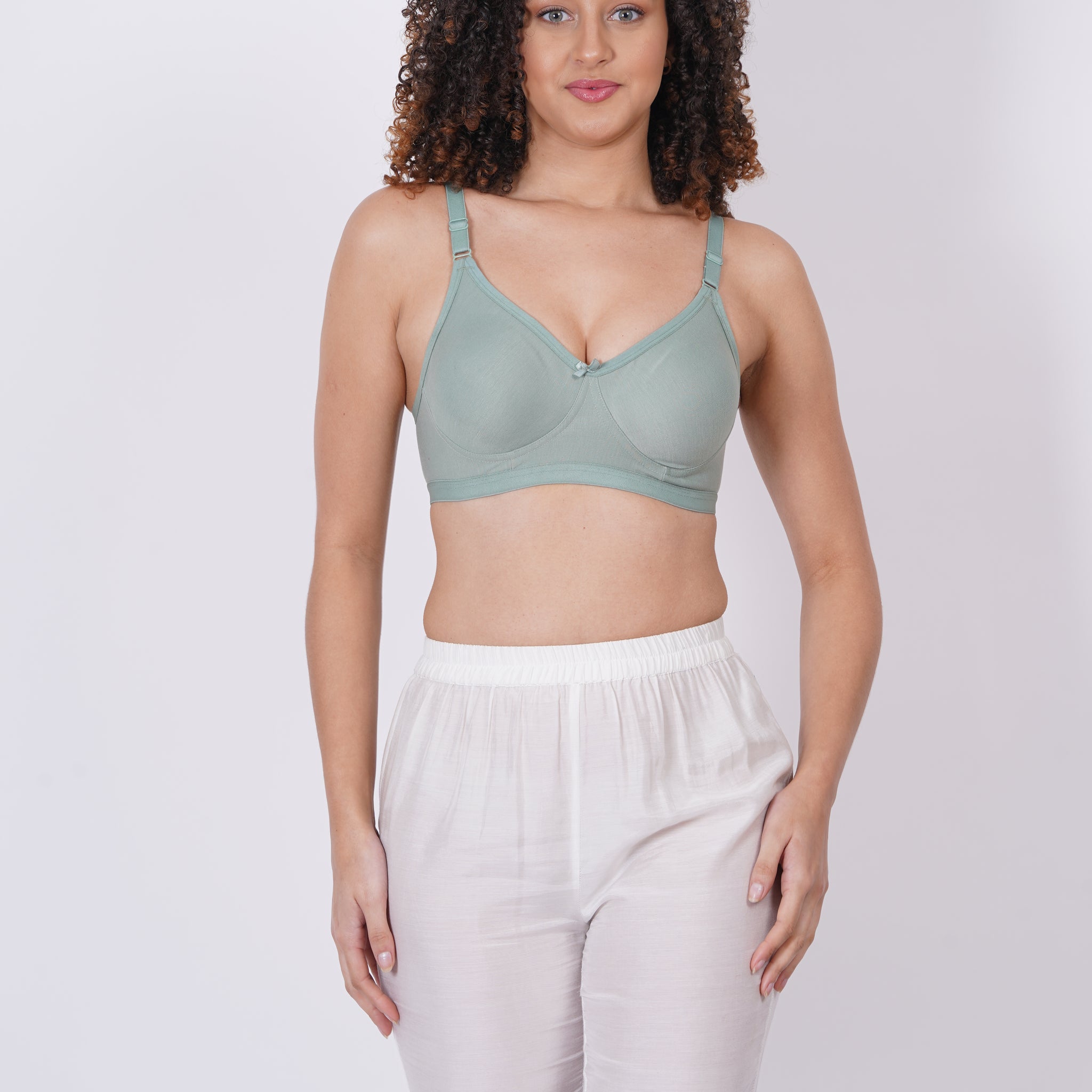 Cup D bra size with molded cups and a pull-on closure, offering seamless bra design and wireless comfort.

