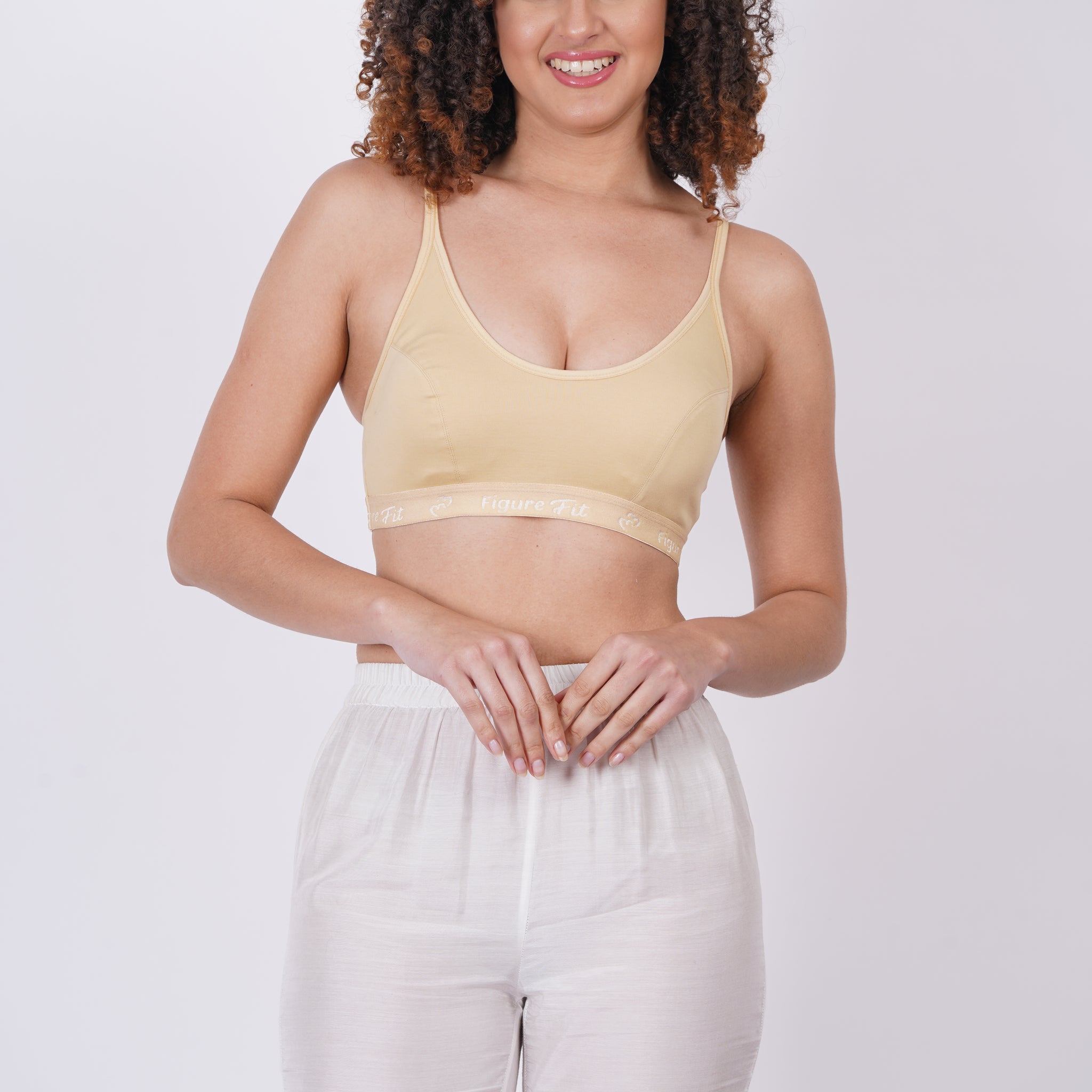 Figure Fit Sports Bra offers breathable synthetic fabric for all-day comfort.
