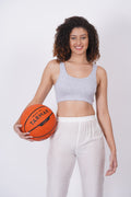 Sports bra online, made with moisture-wicking fabric for sweat control.
