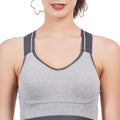 Women's sports bra with a non-padded design, ideal for layering under T-shirts.

