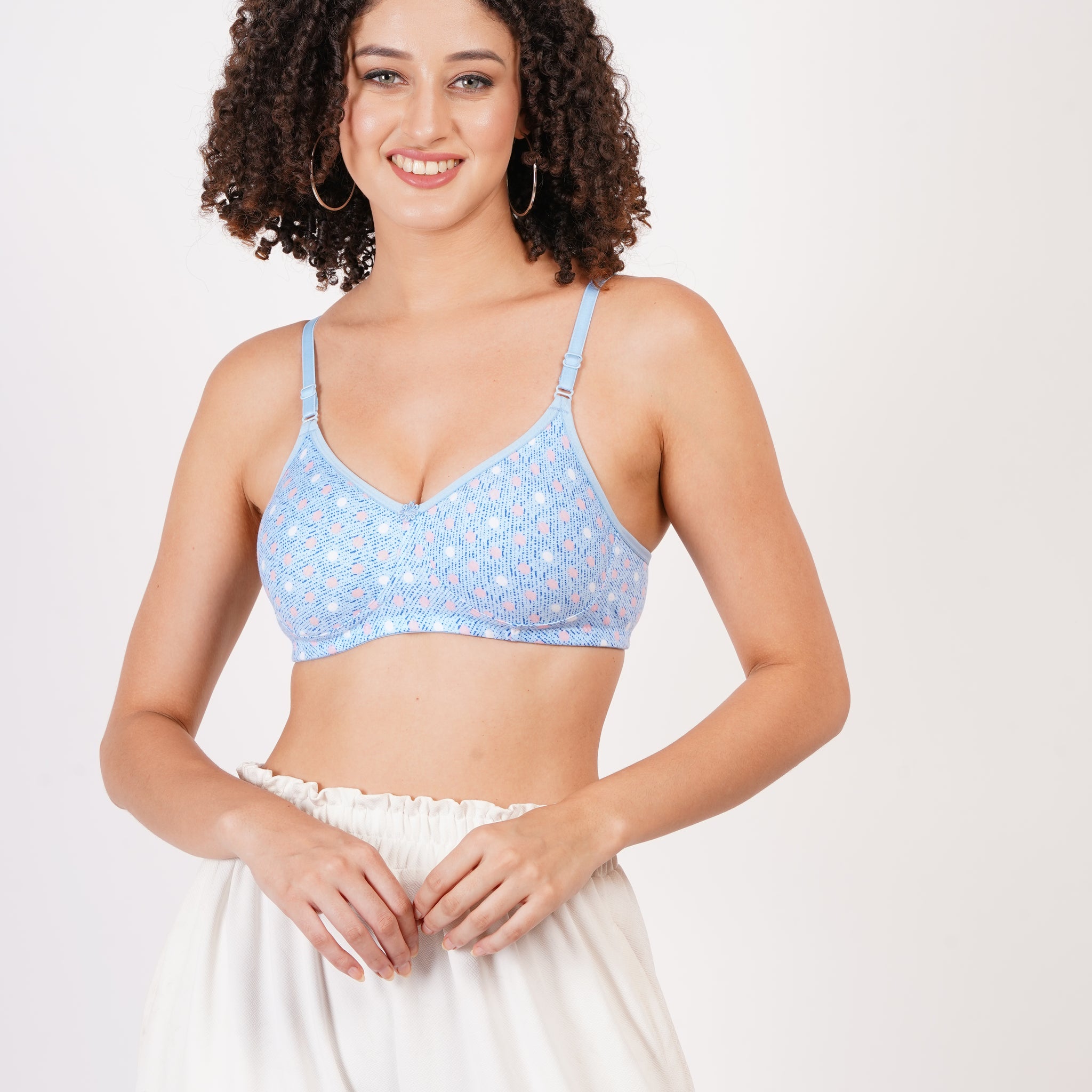 Cup B bra size with seamless molded cups and wire-free comfort. A stylish printed bra offering minimal bra coverage for a natural fit.