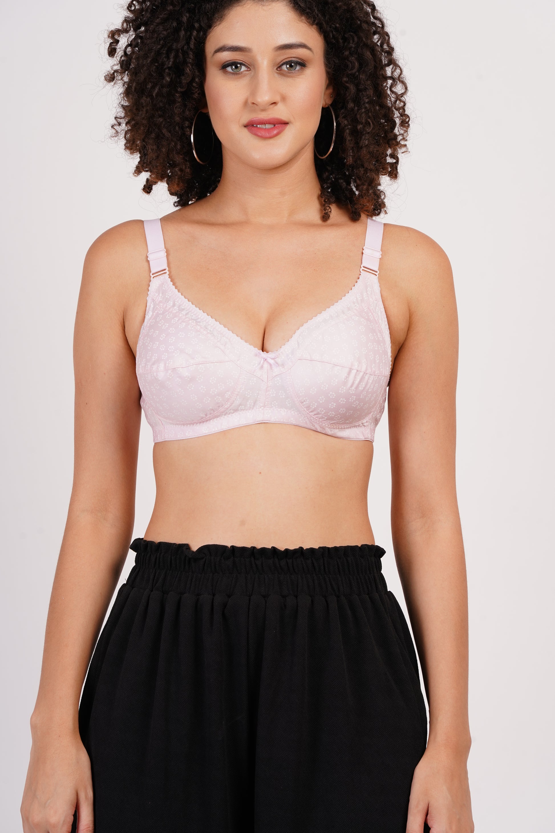 A cotton comfy bra designed for everyday use, offering light padding, wire-free support, and breathability.