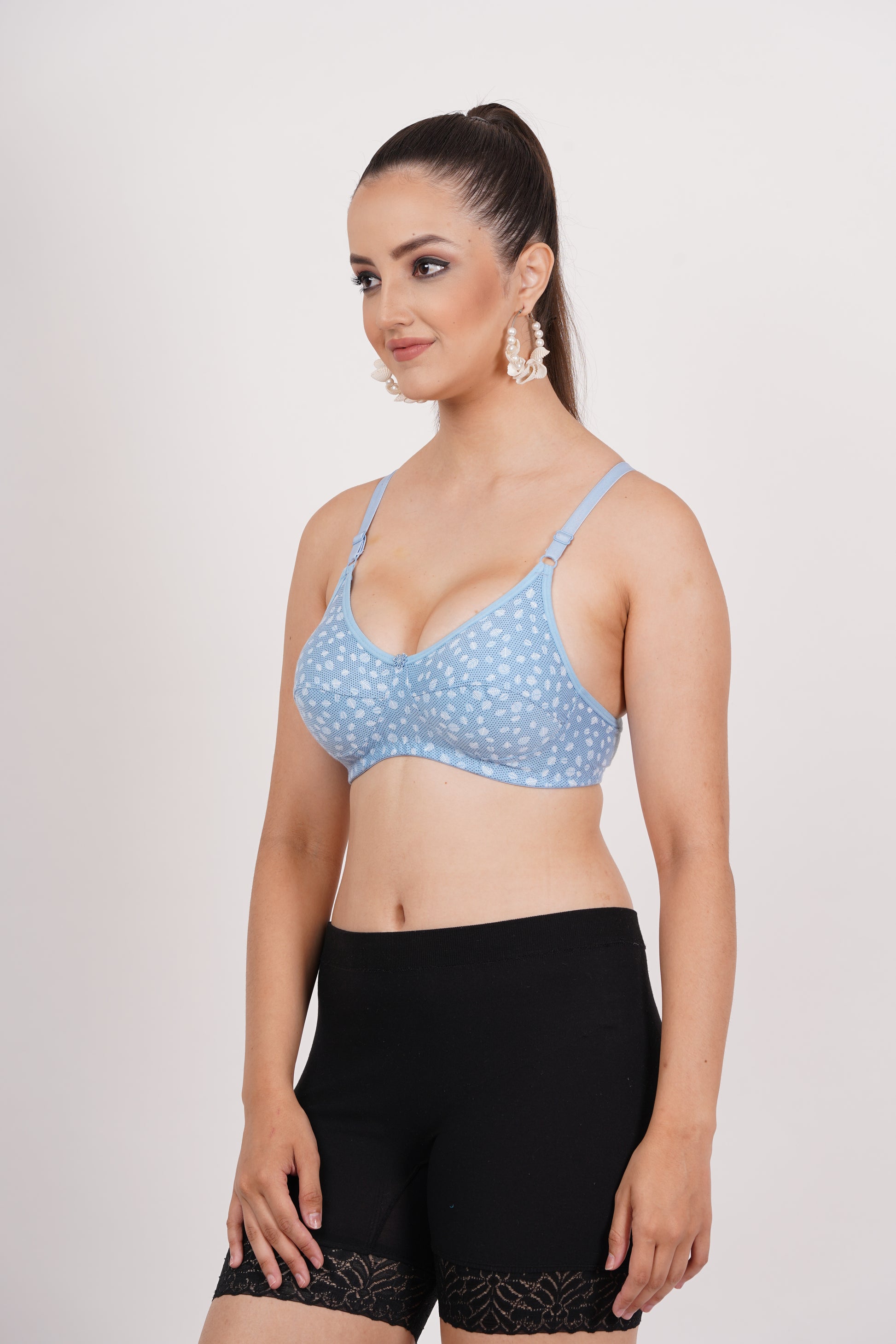 Figure Fit bra with demi coverage and printed bra with secure fit that flatters your figure. 
