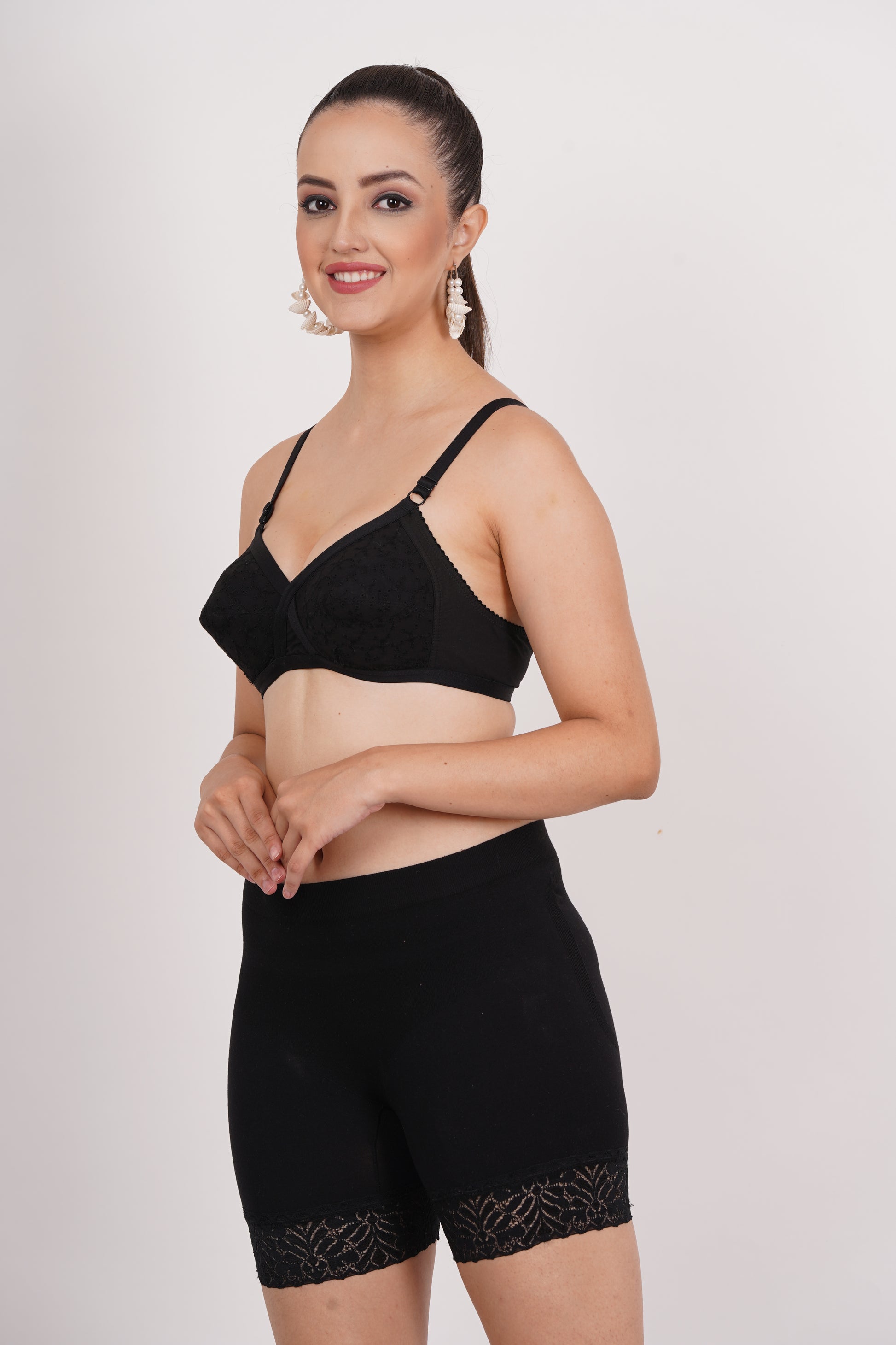 Black color Cotton comfy bra by Figure Fit, made from 100% cotton fabric, featuring minimal bra coverage. Shop Now.
