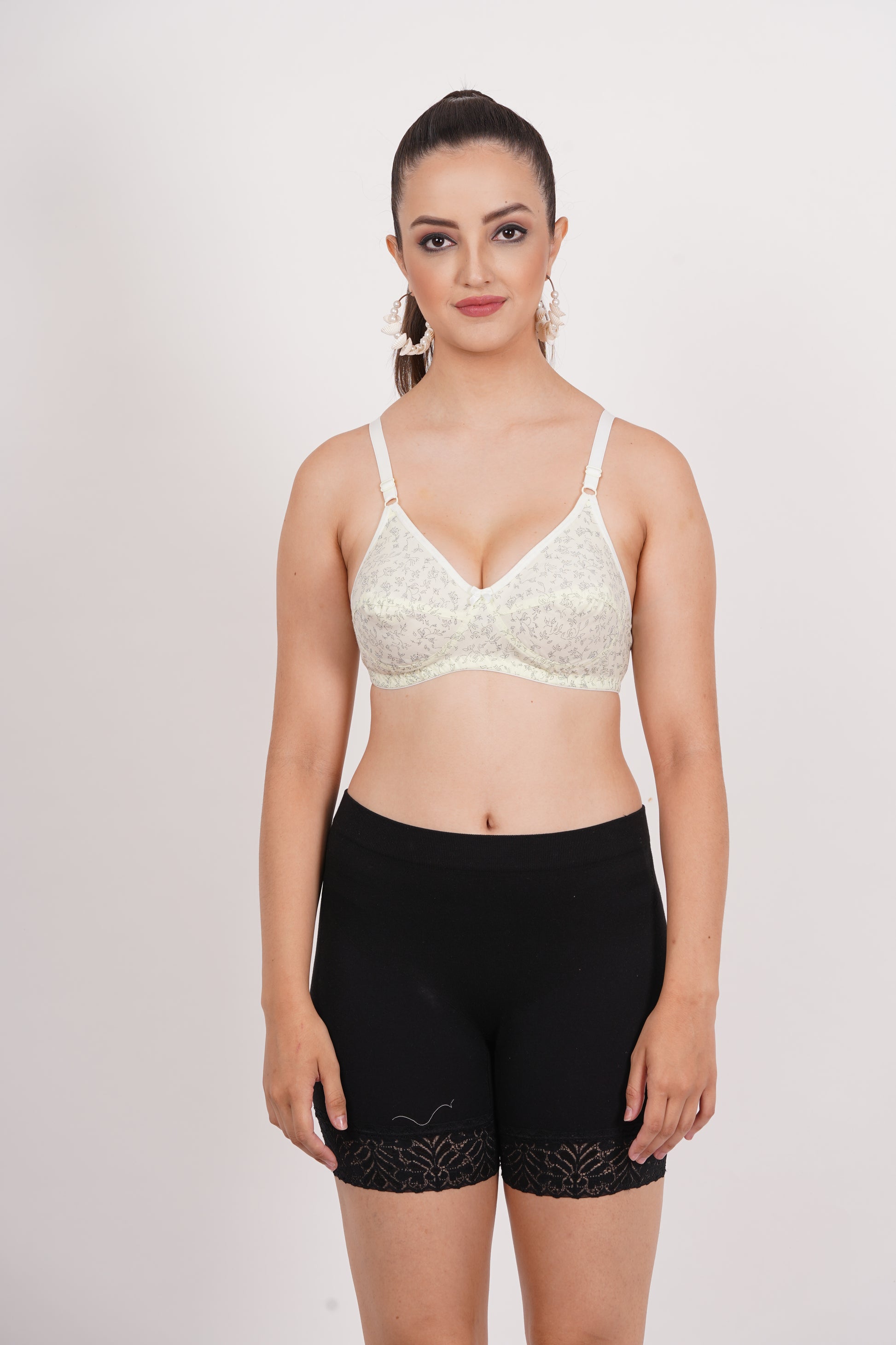 Printed push-up bra for women with back closure, adjustable fit, and comfort style for daily use.