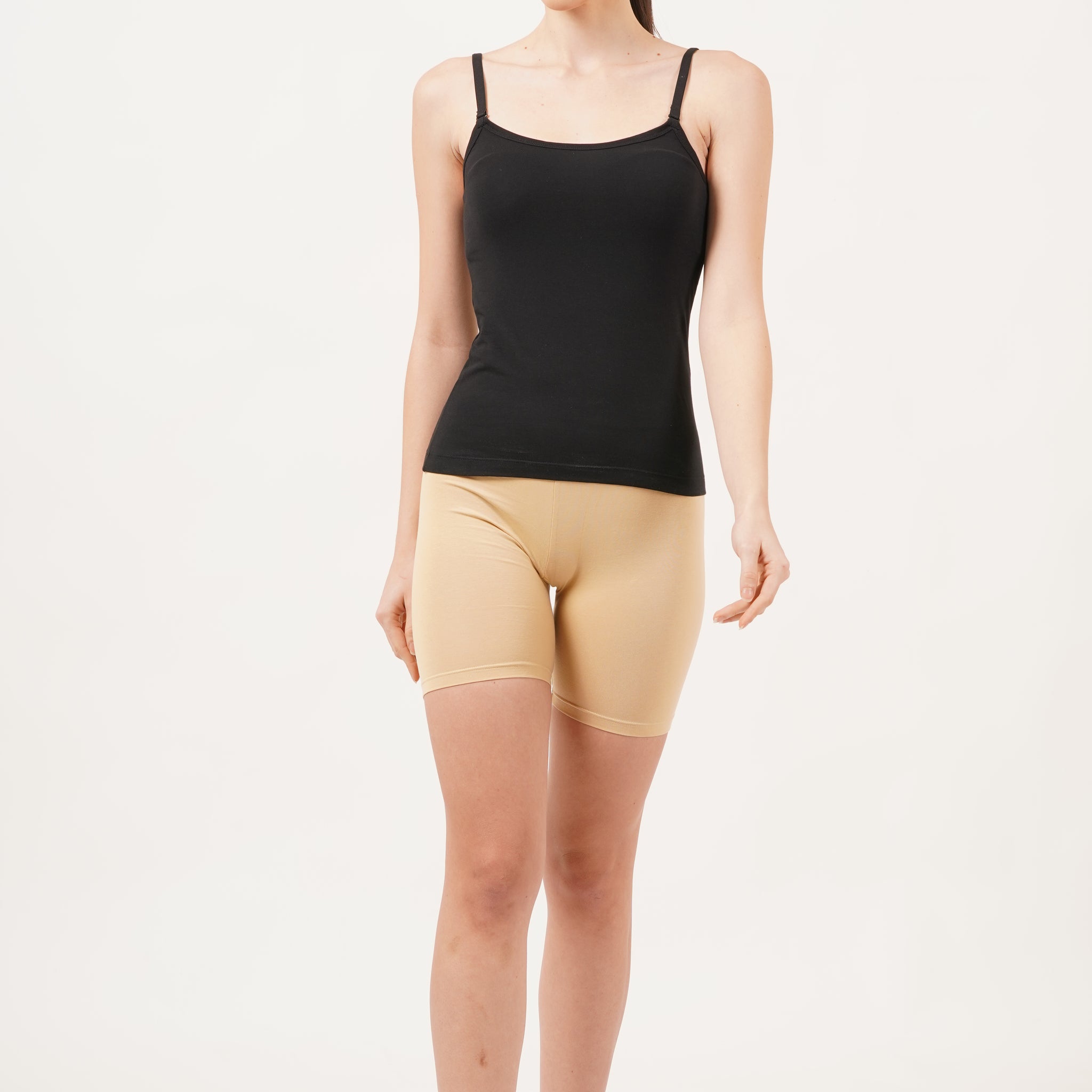 Shop black Camisole for women with a U-neck design, offering a sleek and flattering figure fit.
