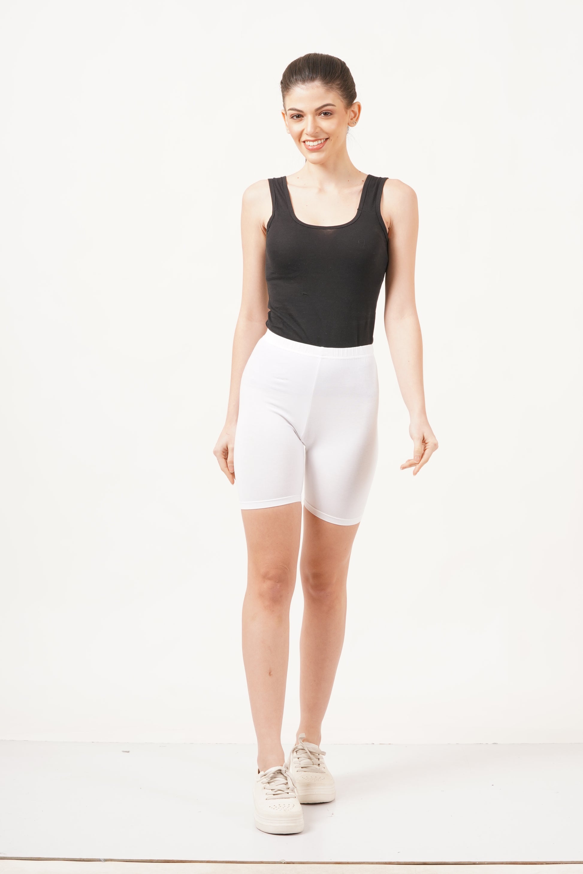 Womens white  lycra cycling shorts with a secure waistband for better stability while riding.
