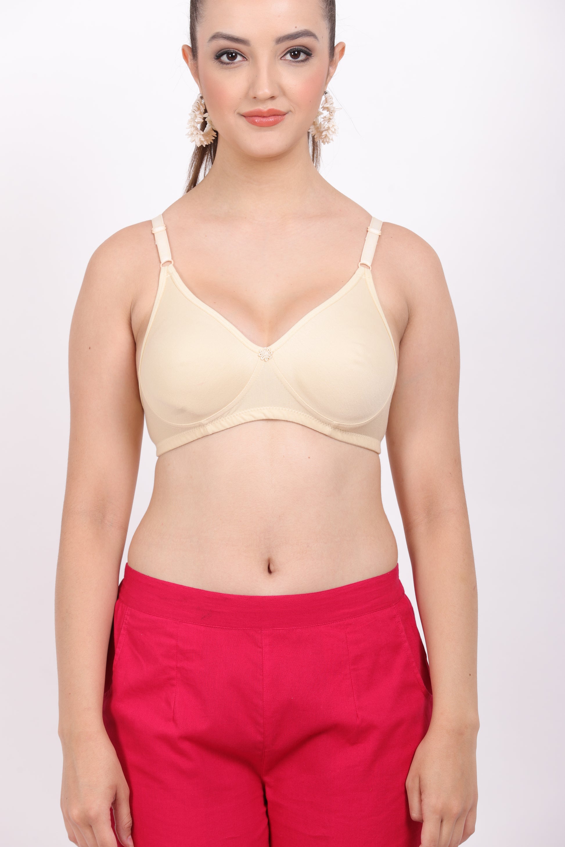 Figure bra with a smooth, seamless design and removable padding. 

