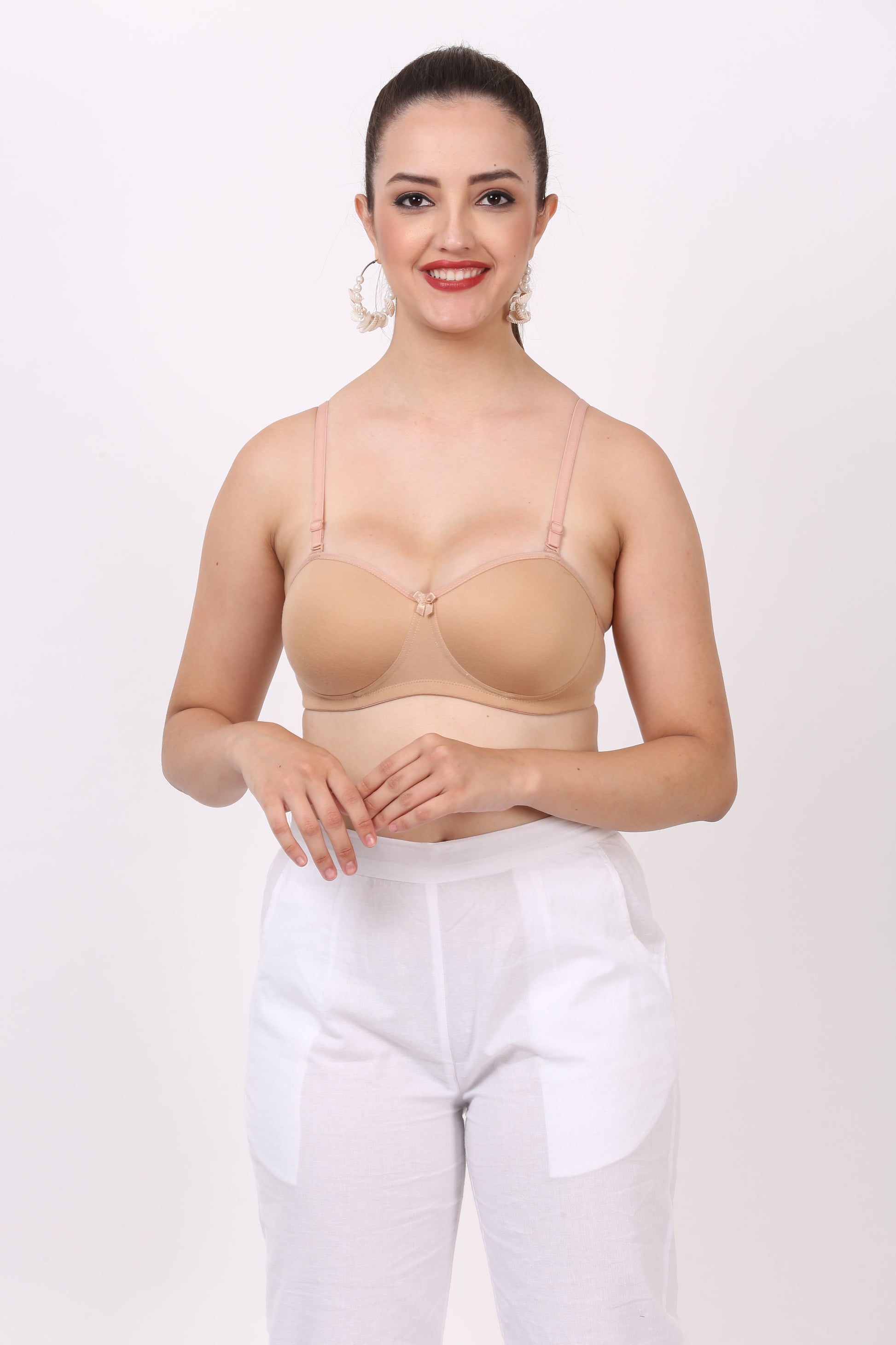 Comfortable figure fit Nude bra with back bra closure and seamless padded style – ideal for 32 B or 34 sizes.

